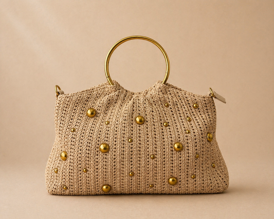 Bolso tachas doradas